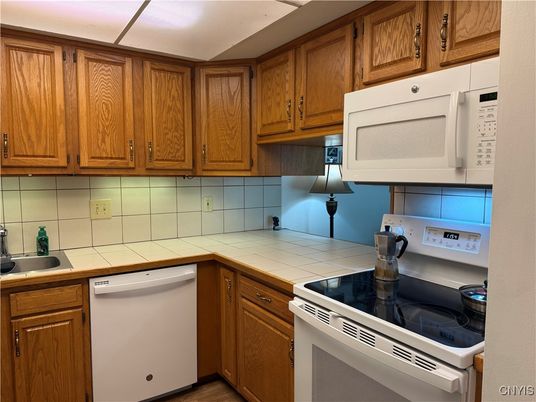 Interior, Kitchen, Tile Countertops, Wood Texture Flooring