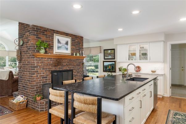 Fireplace, Interior, Kitchen, Recessed Lighting, Stone Walls, Wood Texture Flooring