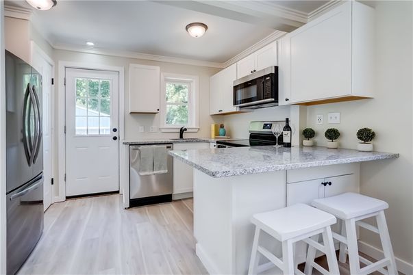 Interior, Kitchen, Recessed Lighting, Stainless Steel Appliances, Wood Texture Flooring