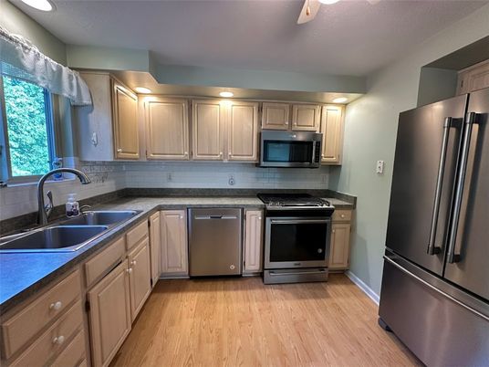Interior, Kitchen, Recessed Lighting, Stainless Steel Appliances, Wood Texture Flooring