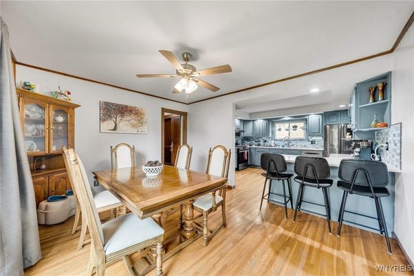 Dining room, Interior, Kitchen, Recessed Lighting, Stainless Steel Appliances, Wood Texture Flooring