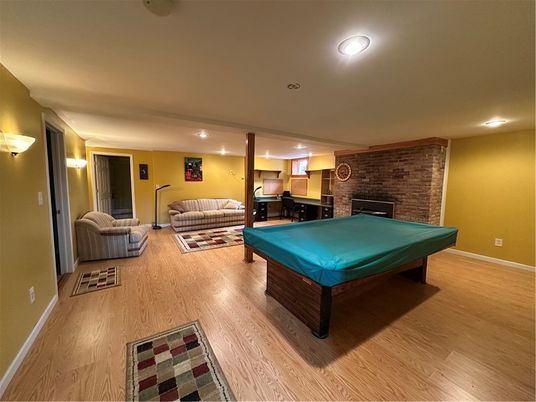 Billiard Table, Game Room, Interior, Living room, Recessed Lighting, Stone Walls, Wood Texture Flooring