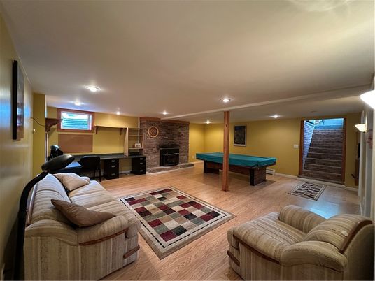 Billiard Table, Fireplace, Game Room, Interior, Recessed Lighting, Stone Walls, Wood Texture Flooring