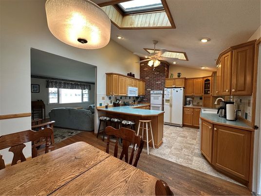 Dining room, Interior, Kitchen, Recessed Lighting, Stone Walls, Wood Texture Flooring