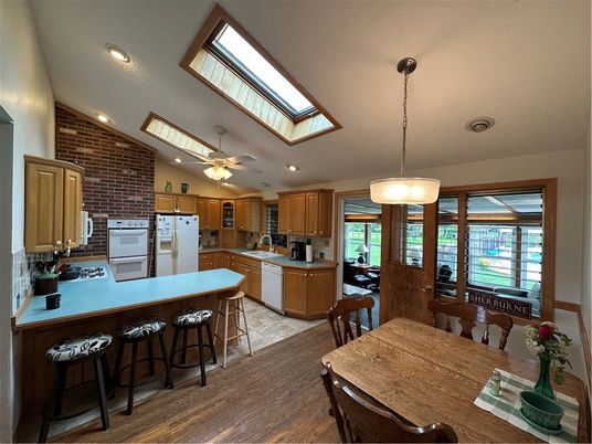 Dining room, Interior, Kitchen, Pendant Lights, Recessed Lighting, Stone Walls, Wood Texture Flooring