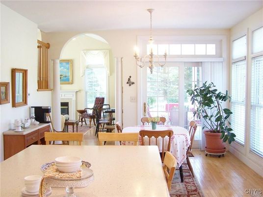 Chandelier, Dining room, Fireplace, Interior, Living room, Wood Texture Flooring