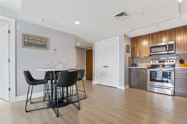 Interior, Kitchen, Recessed Lighting, Stainless Steel Appliances, Wood Texture Flooring