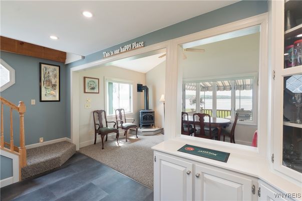 Dining room, Fireplace, Interior, Recessed Lighting, Water, Wood Texture Flooring