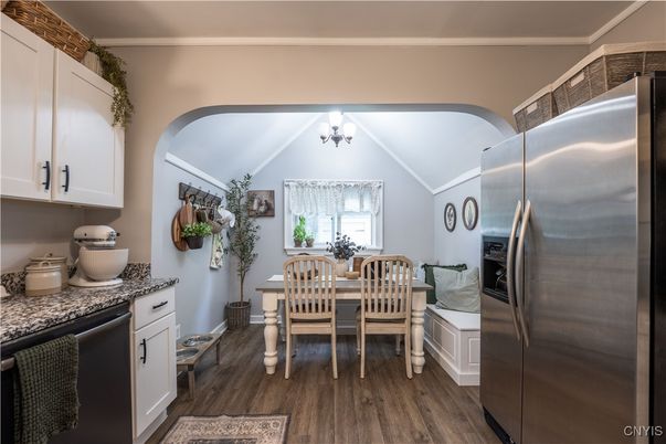 Chandelier, Dining room, Interior, Kitchen, Stainless Steel Appliances, Wood Texture Flooring