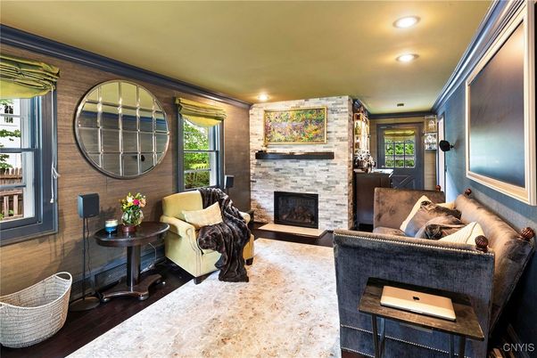 Fireplace, Interior, Living room, Recessed Lighting, Stone Walls, Wood Texture Flooring