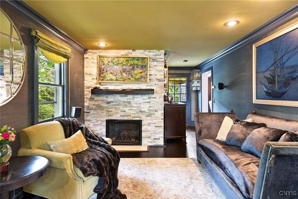 Fireplace, Interior, Living room, Recessed Lighting, Stone Walls, Wood Texture Flooring