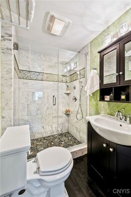 Bathroom, Glass Shower, Interior, Marble Walls, Wood Texture Flooring