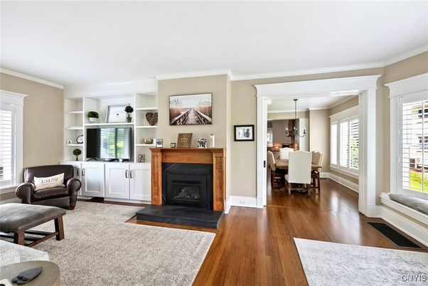Chandelier, Dining room, Fireplace, Interior, Pendant Lights, Wood Texture Flooring