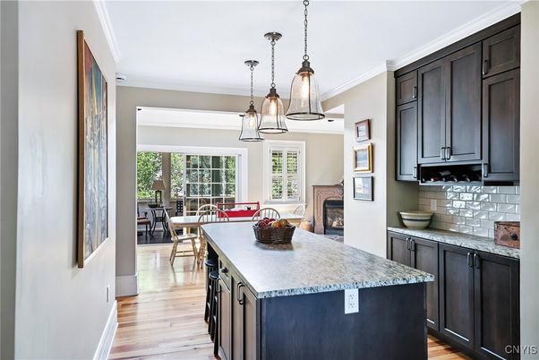 Dining room, Fireplace, Interior, Kitchen, Pendant Lights, Wood Texture Flooring