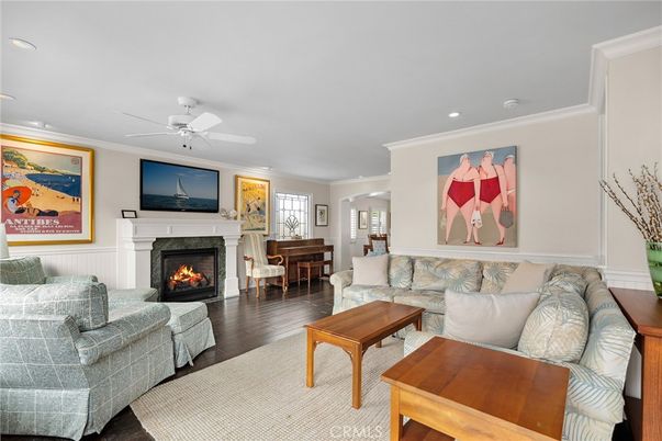 Fireplace, Interior, Living room, Piano, Recessed Lighting, Wood Texture Flooring