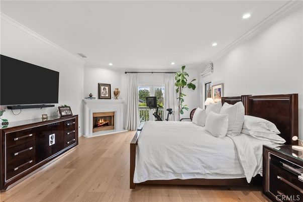 Bedroom, Fireplace, Interior, Recessed Lighting, Wood Texture Flooring