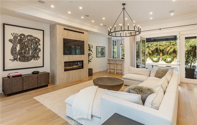 Chandelier, Fireplace, Interior, Living room, Recessed Lighting, Wood Texture Flooring