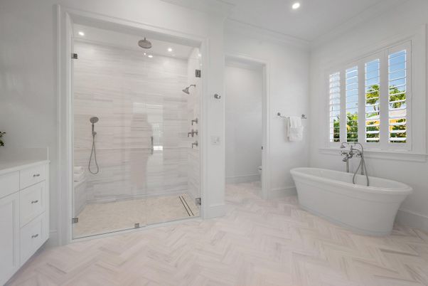 Bathroom, Free Standing Baths, Glass Shower, Interior, Recessed Lighting, Wood Texture Flooring