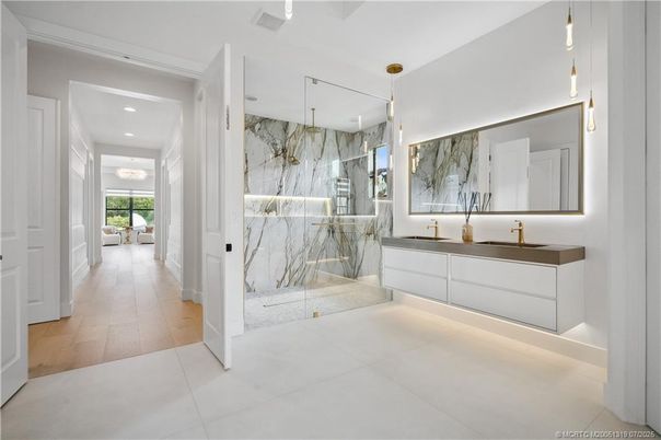 Bathroom, Glass Shower, Interior, Marble Walls, Recessed Lighting, Wood Texture Flooring