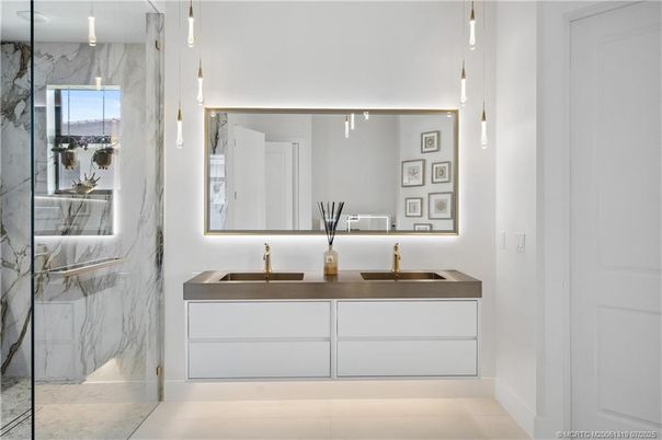 Bathroom, Dual Sink Vanities, Glass Shower, Interior, Marble Walls, Pendant Lights