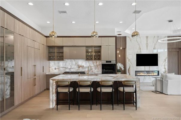 Fireplace, Interior, Kitchen, Marble Walls, Pendant Lights, Recessed Lighting, Wood Texture Flooring