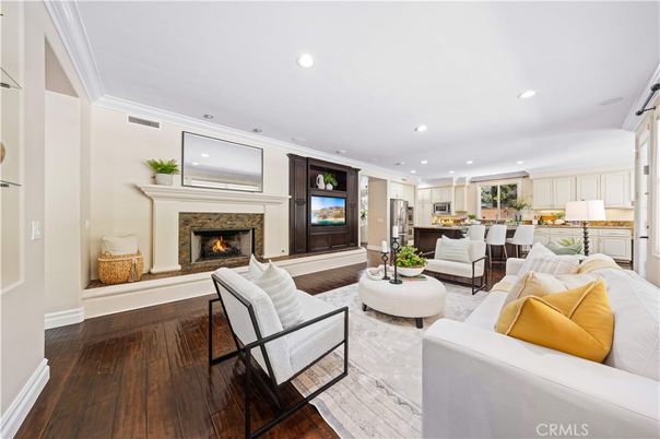 Dining room, Fireplace, Interior, Kitchen, Living room, Recessed Lighting, Stainless Steel Appliances, Wood Texture Flooring