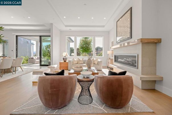Dining room, Fireplace, Interior, Living room, Recessed Lighting, Wood Texture Flooring