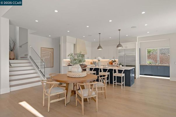 Dining room, Interior, Kitchen, Pendant Lights, Recessed Lighting, Stainless Steel Appliances, Wood Texture Flooring