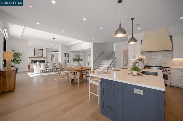 Dining room, Interior, Kitchen, Pendant Lights, Recessed Lighting, Stainless Steel Appliances, Wood Texture Flooring