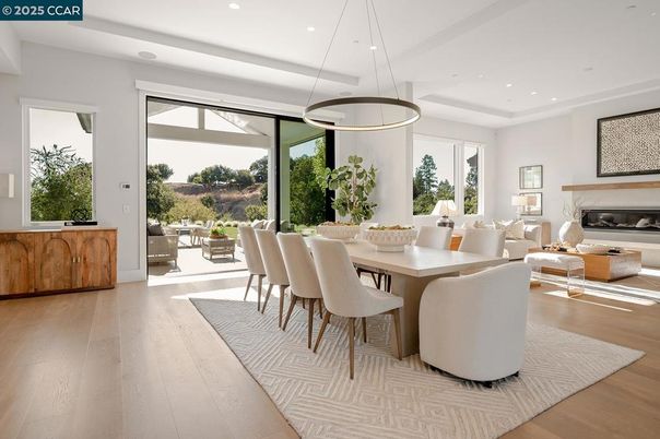 Dining room, Fireplace, Interior, Living room, Pendant Lights, Recessed Lighting, Wood Texture Flooring