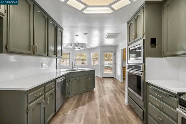 Chandelier, Interior, Kitchen, Stainless Steel Appliances, Wood Texture Flooring