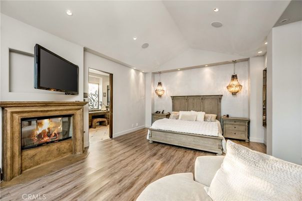Bedroom, Fireplace, Interior, Pendant Lights, Recessed Lighting, Wood Texture Flooring