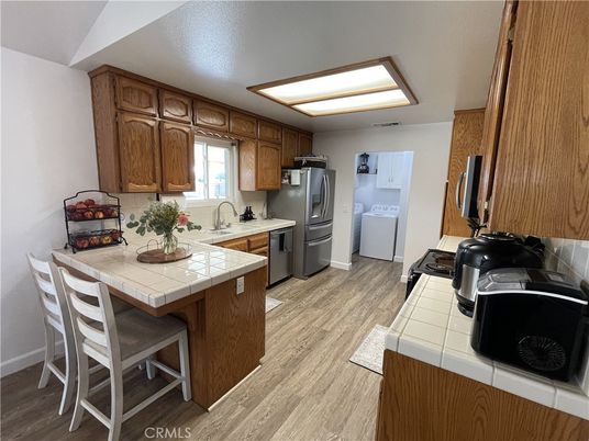 Interior, Kitchen, Tile Countertops, Wood Texture Flooring