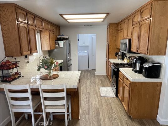 Interior, Kitchen, Tile Countertops, Wood Texture Flooring