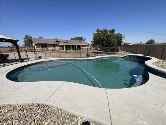 Exterior, Pool, Solar Panels