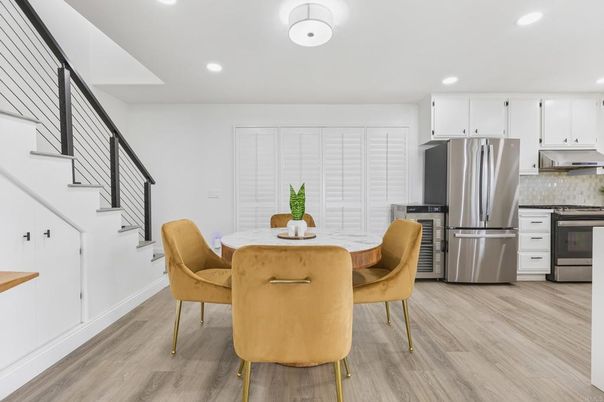Dining room, Interior, Kitchen, Recessed Lighting, Stainless Steel Appliances, Wood Texture Flooring