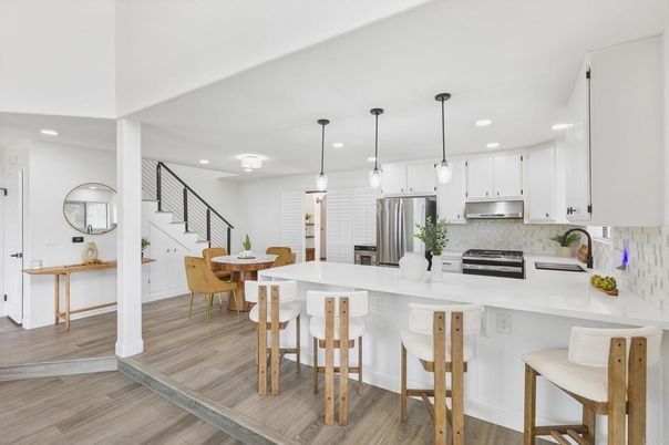 Dining room, Interior, Kitchen, Pendant Lights, Recessed Lighting, Stainless Steel Appliances, Wood Texture Flooring