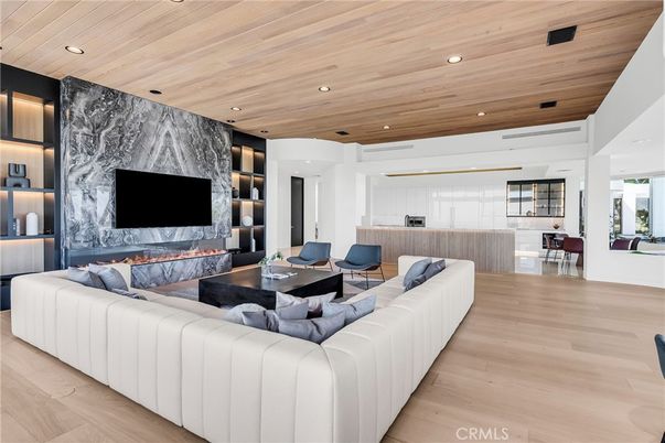 Fireplace, Interior, Living room, Marble Walls, Recessed Lighting, Wooden Ceilings, Wood Texture Flooring