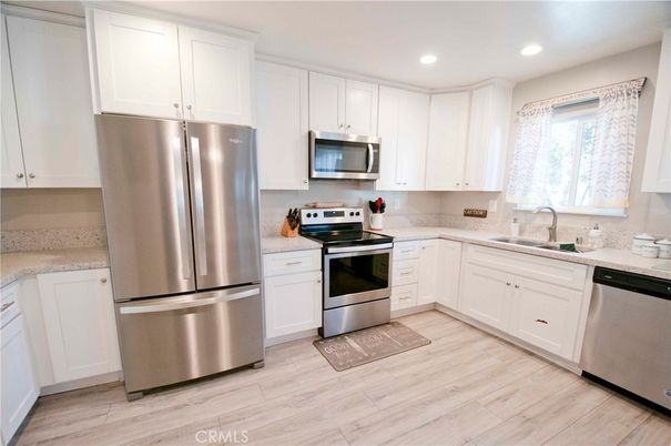Interior, Kitchen, Recessed Lighting, Stainless Steel Appliances, Wood Texture Flooring