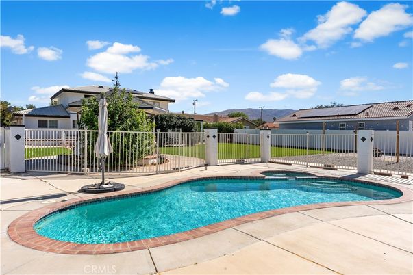 Exterior, Pool, Solar Panels