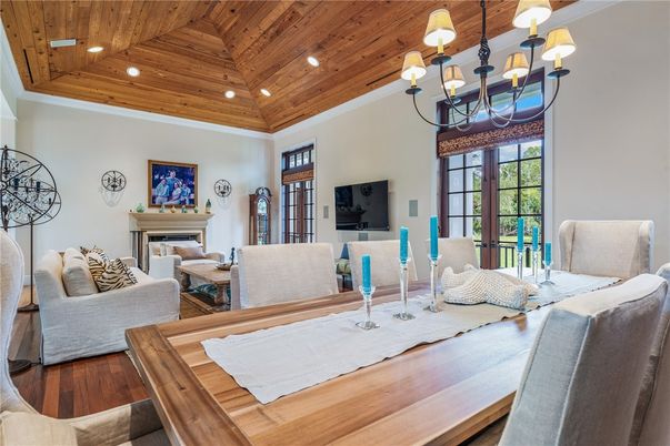 Chandelier, Dining room, Fireplace, Interior, Living room, Recessed Lighting, Wooden Ceilings, Wood Texture Flooring