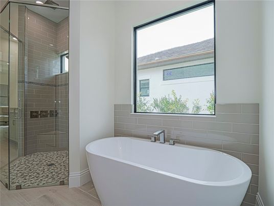 Bathroom, Free Standing Baths, Glass Shower, Interior, Wood Texture Flooring