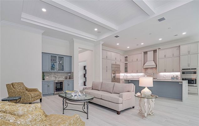 Fireplace, Interior, Kitchen, Living room, Recessed Lighting, Stainless Steel Appliances, Wood Texture Flooring