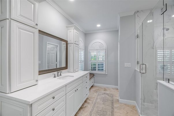 Bathroom, Dual Sink Vanities, Glass Shower, Interior, Marble Walls, Recessed Lighting