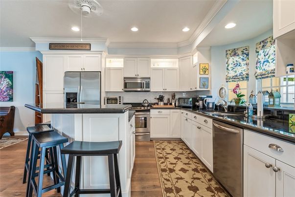 Interior, Kitchen, Recessed Lighting, Stainless Steel Appliances, Wood Texture Flooring