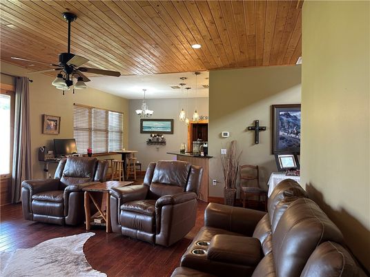Chandelier, Dining room, Interior, Living room, Pendant Lights, Recessed Lighting, Wooden Ceilings, Wood Texture Flooring