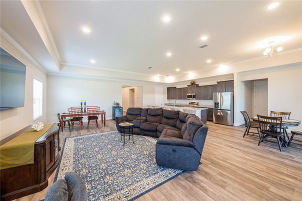 Dining room, Interior, Kitchen, Living room, Recessed Lighting, Stainless Steel Appliances, Wood Texture Flooring