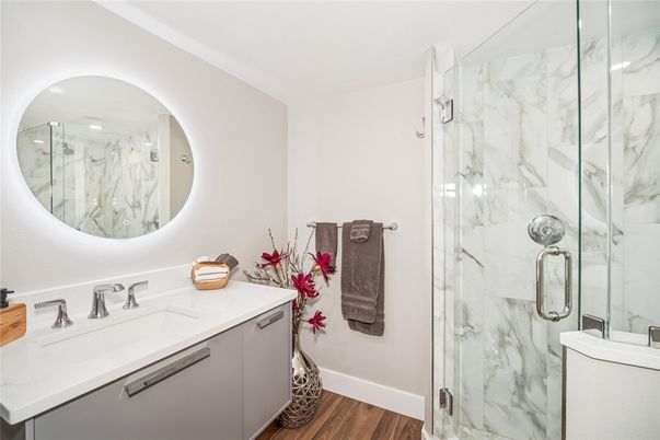 Bathroom, Glass Shower, Interior, Marble Walls, Wood Texture Flooring