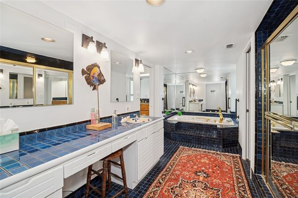 Bathroom, Dual Sink Vanities, Interior, Recessed Lighting, Tile Countertops