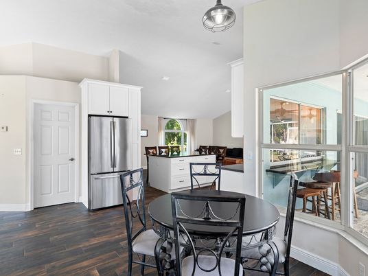 Dining room, Interior, Kitchen, Recessed Lighting, Stainless Steel Appliances, Wood Texture Flooring